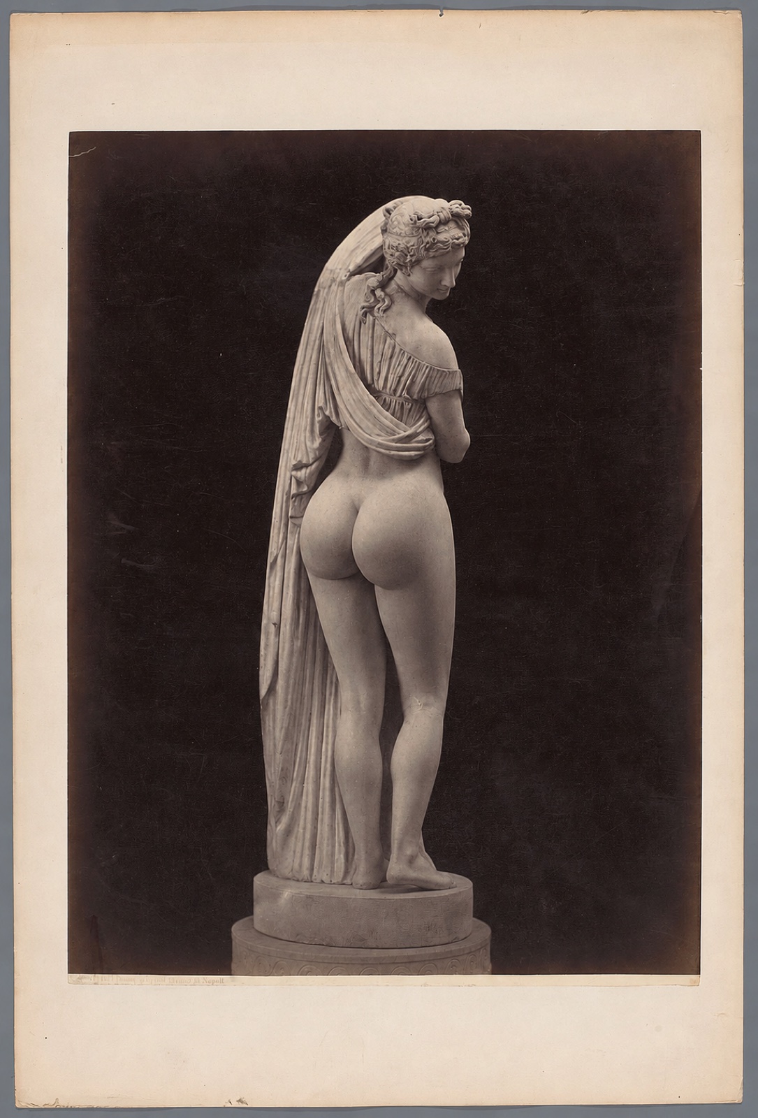 Edited classical sculpture photograph emphasizing a modern glute-training aesthetic